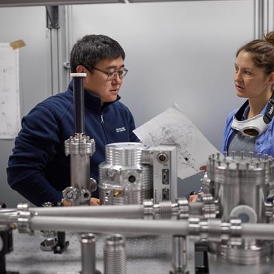 Charlotte and her colleague discussing in the Artemis lab.