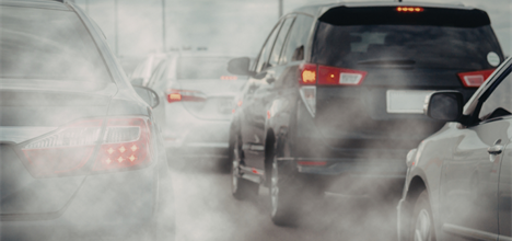 Canva stock photo of cars in traffic with fumes