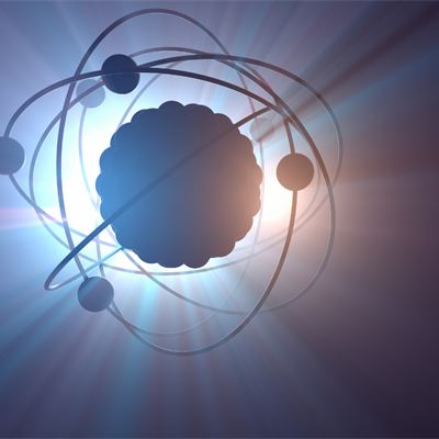 scientific illustration of an atom, backlit by rays of warm toned light.