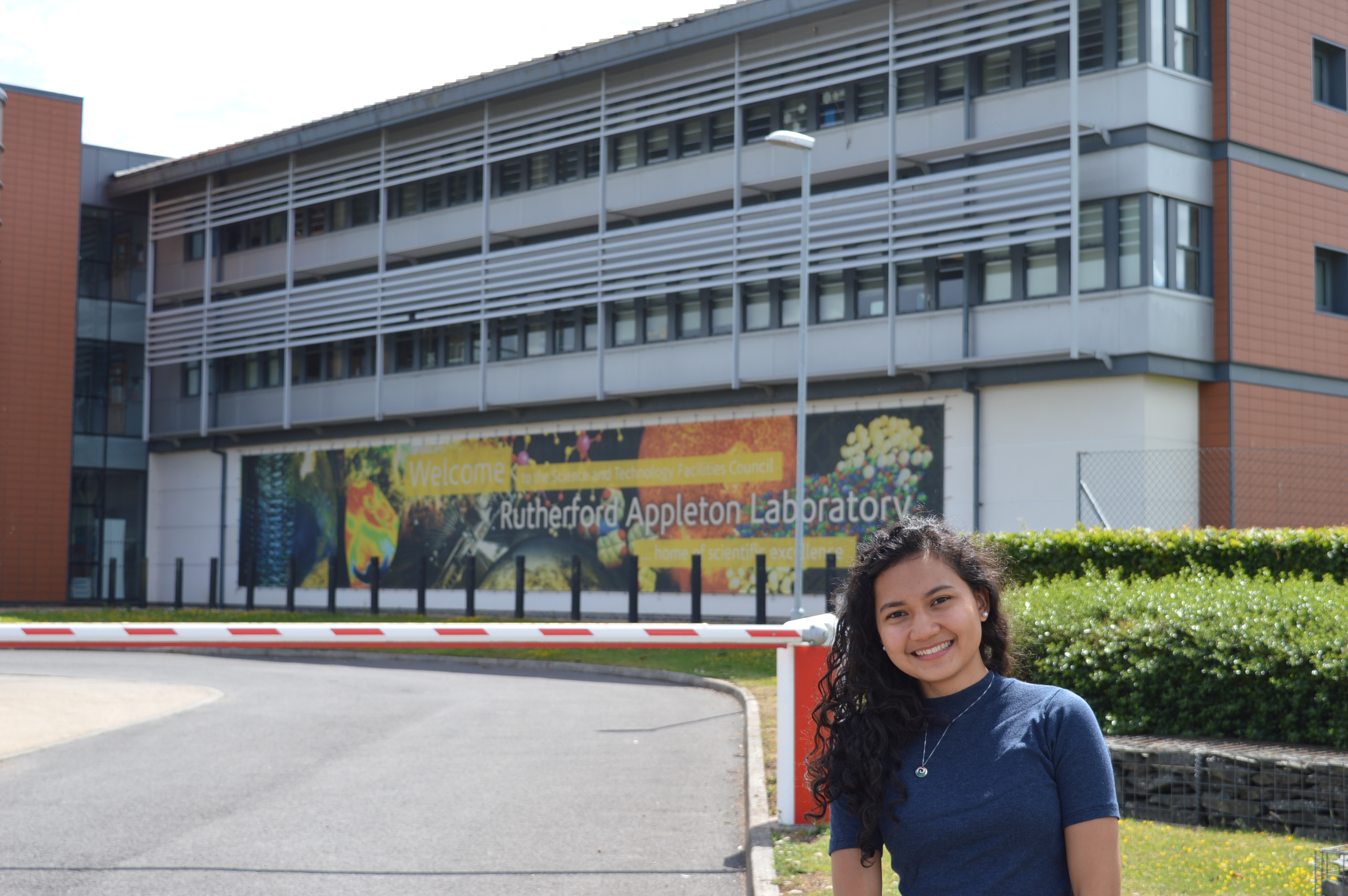 Viviene Marie Dela Cruz in front of the Rutherford Appleton Laboratory.